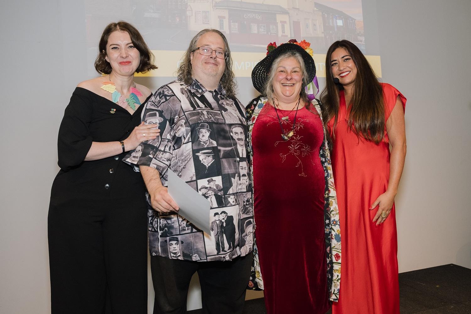 Ian Robinson and Estelle Bryers presented with the award by Radio 1 film critic Rhianna Dhilon and Cinema For All CEO Jaq Chell