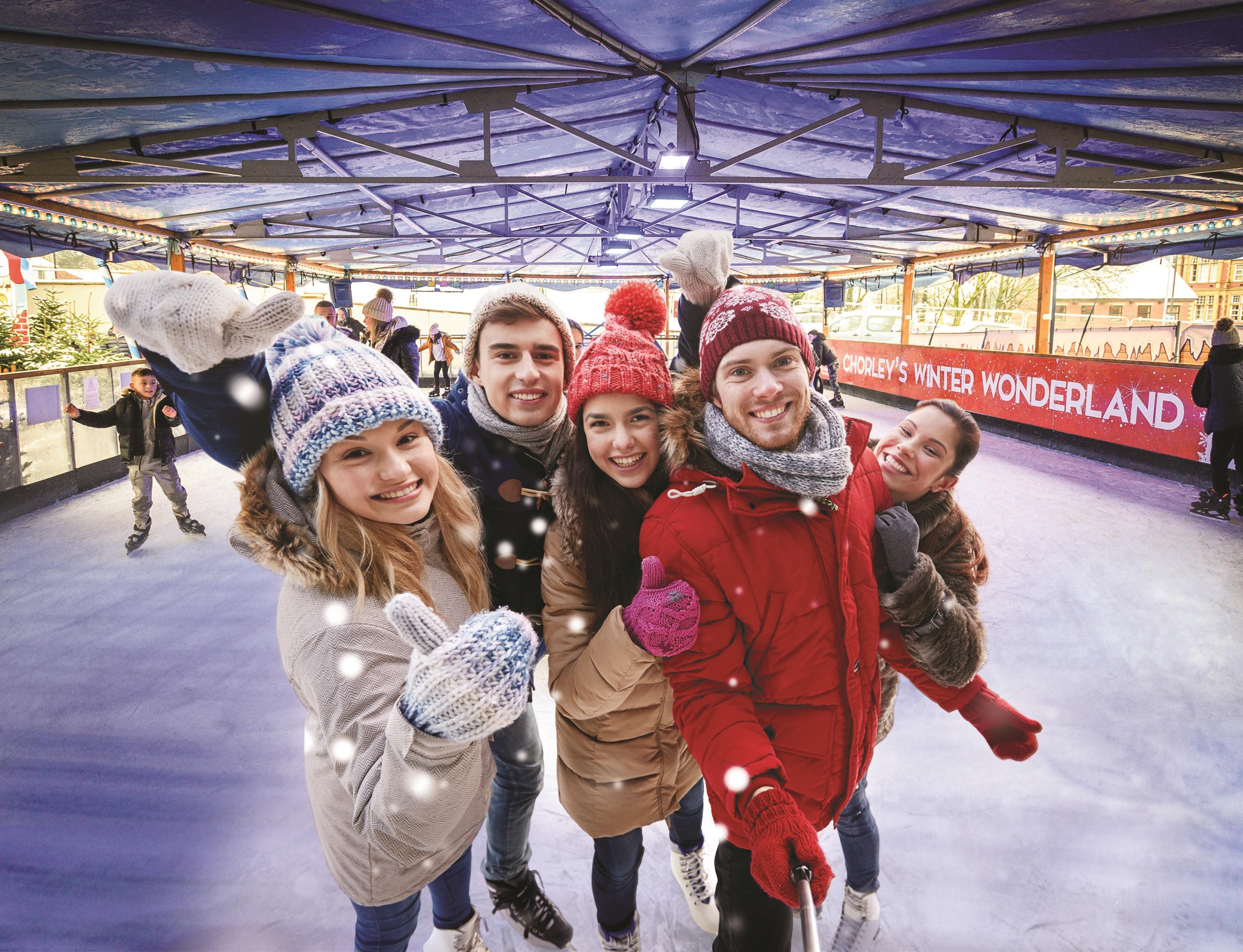 Ice skaters on ice rink
