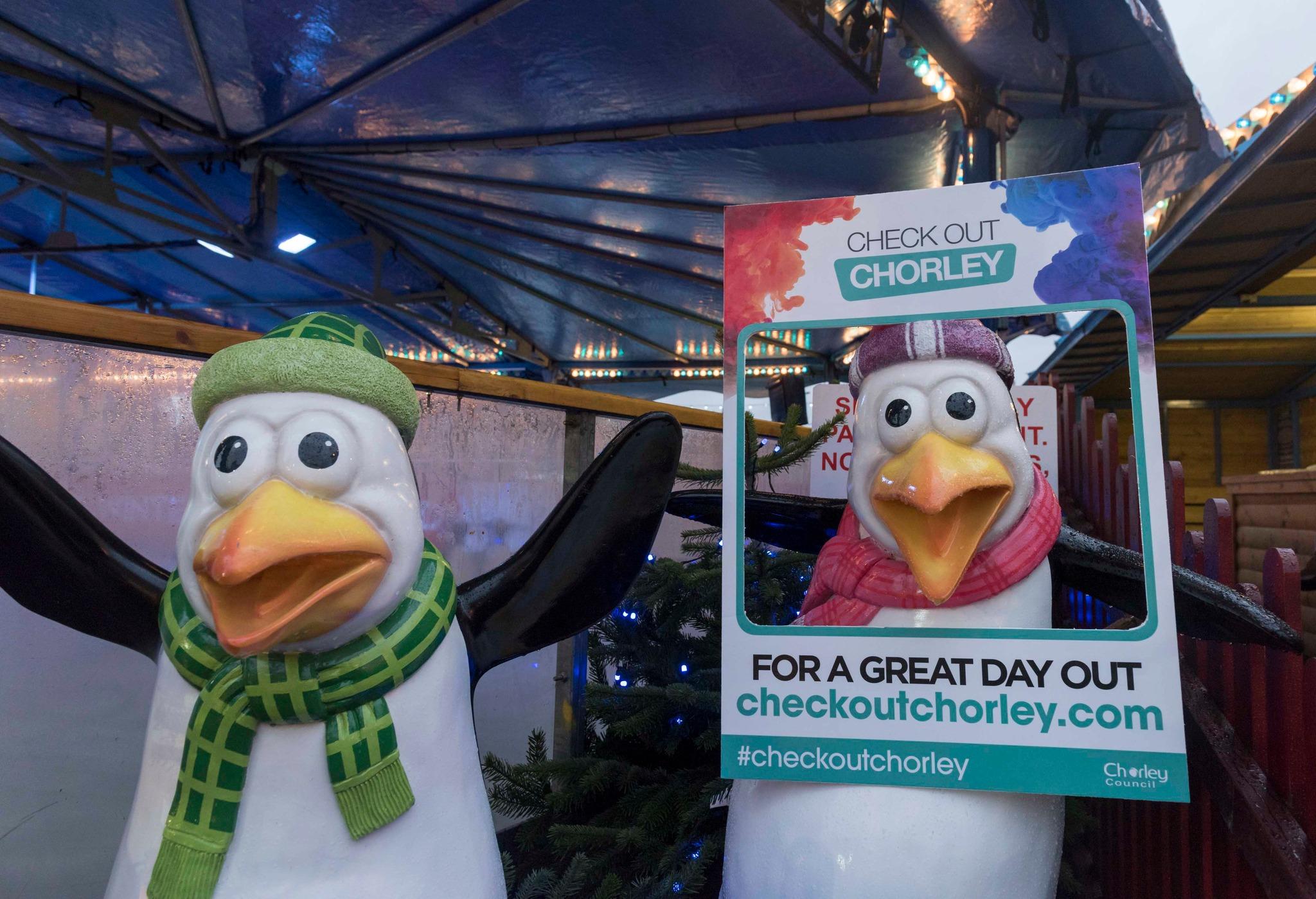 Penguin statues at Chorley's Winter Wonderland